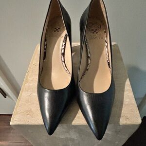 Black Vince Camuto pumps, worn several times are in good condition.